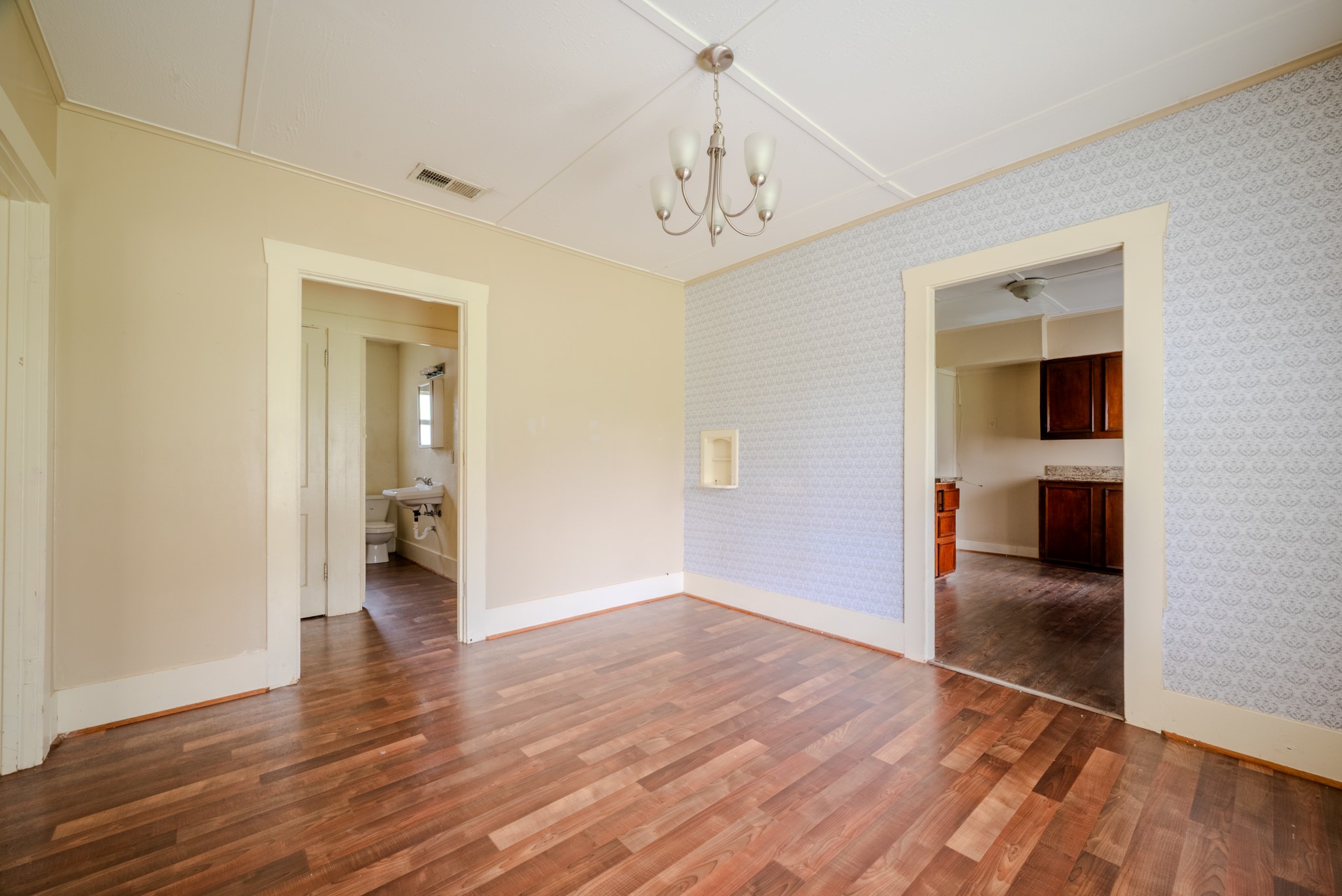 603 North Resident Street Wharton, TX 77488 - Photo 13 of 45 wooden floor in an empty room with a gallery
