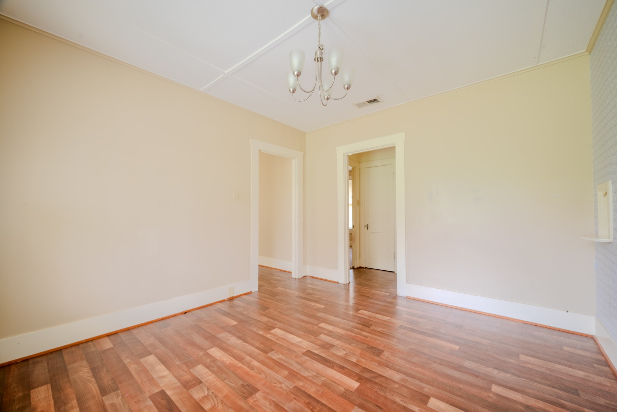 603 North Resident Street Wharton, TX 77488 - Photo 14 of 45 a view of an empty room with wooden floor
