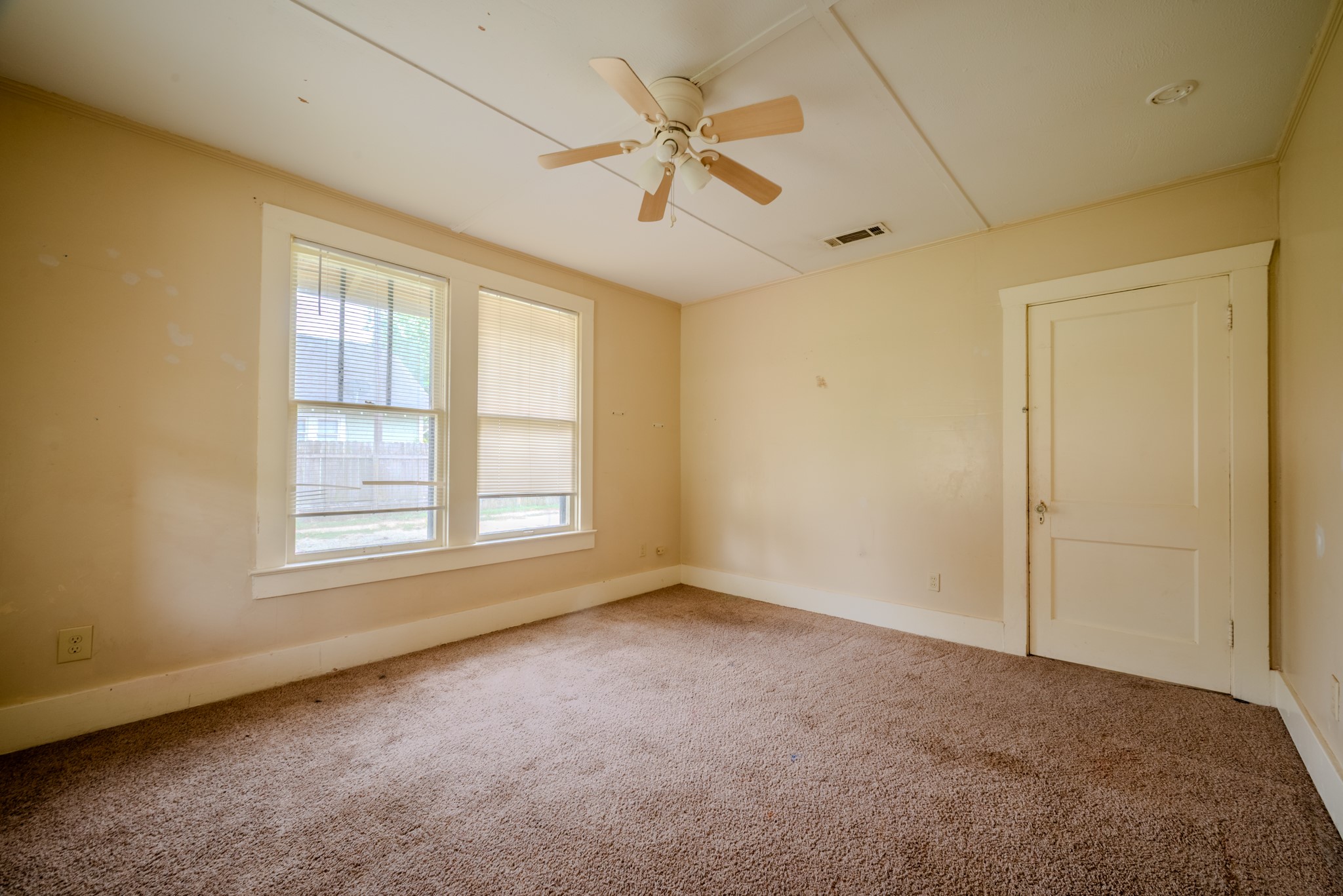 603 North Resident Street Wharton, TX 77488 - Photo 17 of 45 an empty room with fan and windows