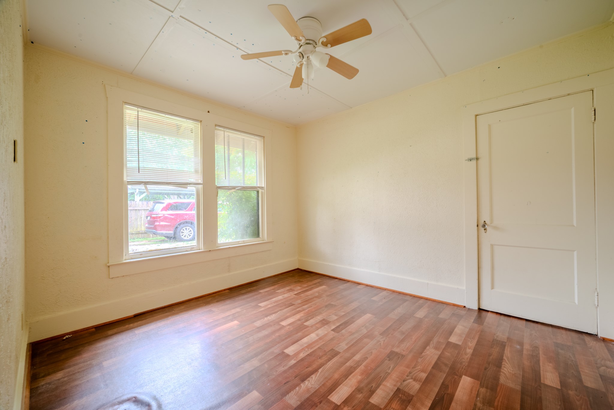 603 North Resident Street Wharton, TX 77488 - Photo 22 of 45 wooden floor in an empty room with a window