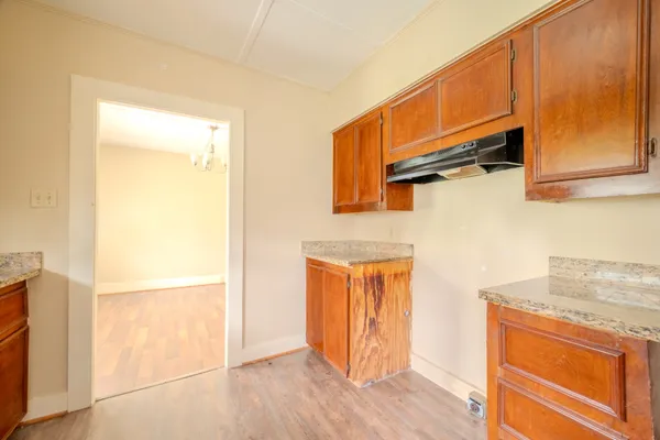 a view of a storage & utility room with wooden floor