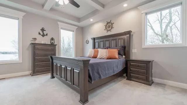 a bathroom with bathtub with window