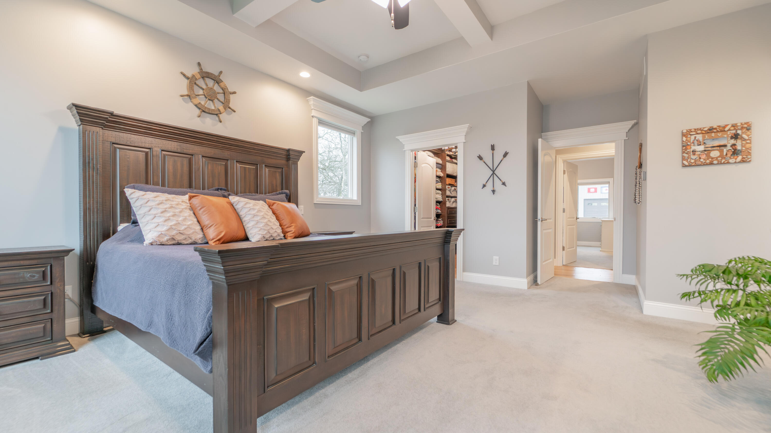 16489 Harrison Street Lowell, IN 46356 - Photo 22 of 67 a bedroom with a large bed and a chandelier