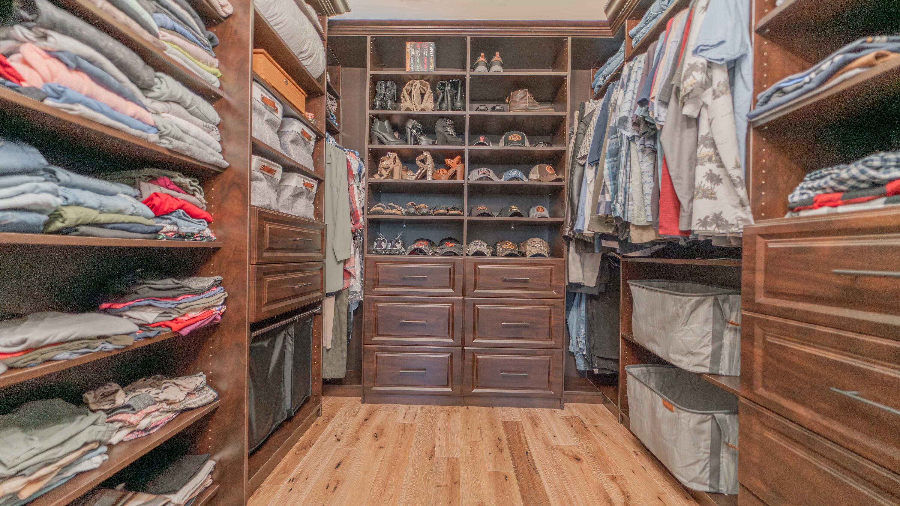 16489 Harrison Street Lowell, IN 46356 - Photo 23 of 67 a view of walk in closet with clothes and shoes