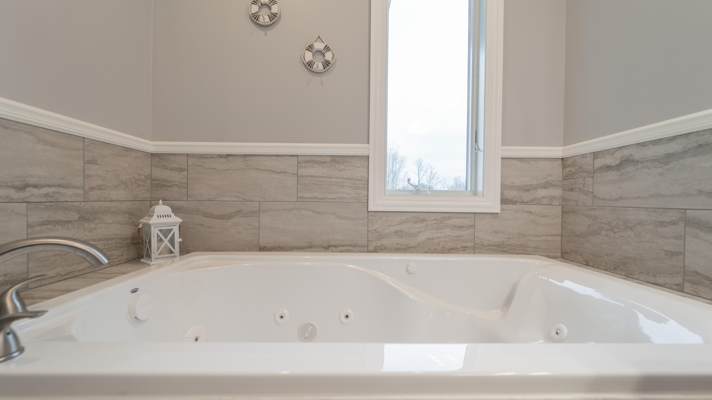 16489 Harrison Street Lowell, IN 46356 - Photo 25 of 67 a bathroom with bathtub with window