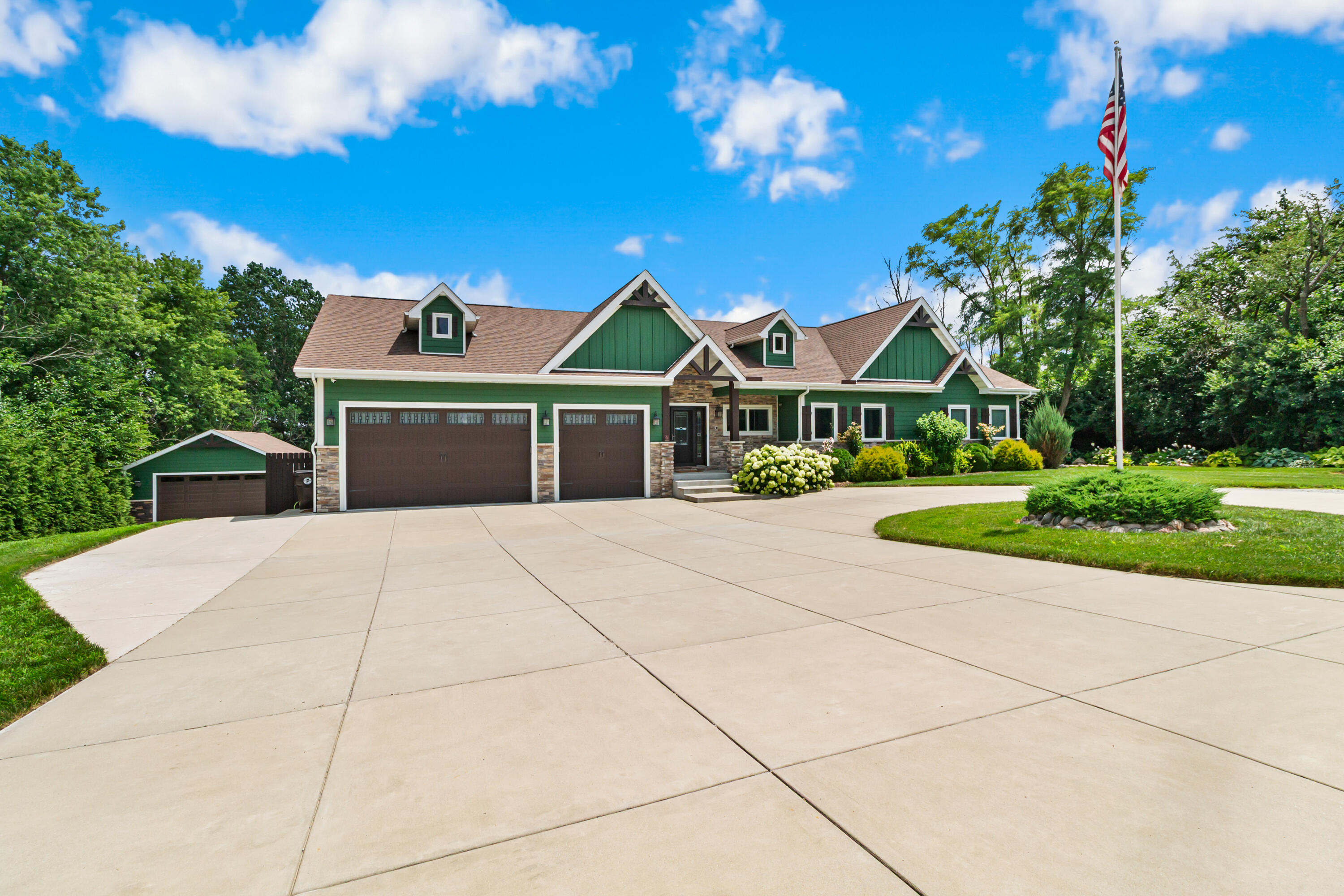 16489 Harrison Street Lowell, IN 46356 - Photo 3 of 67 a front view of a house with a garden