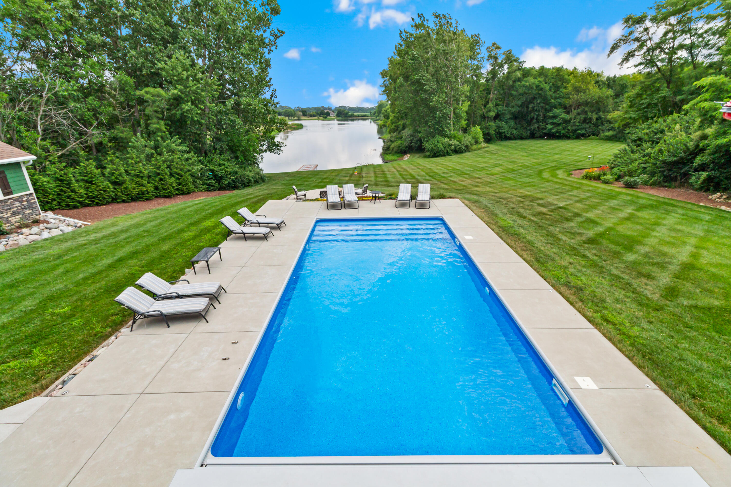16489 Harrison Street Lowell, IN 46356 - Photo 6 of 67 a view of swimming pool with a yard
