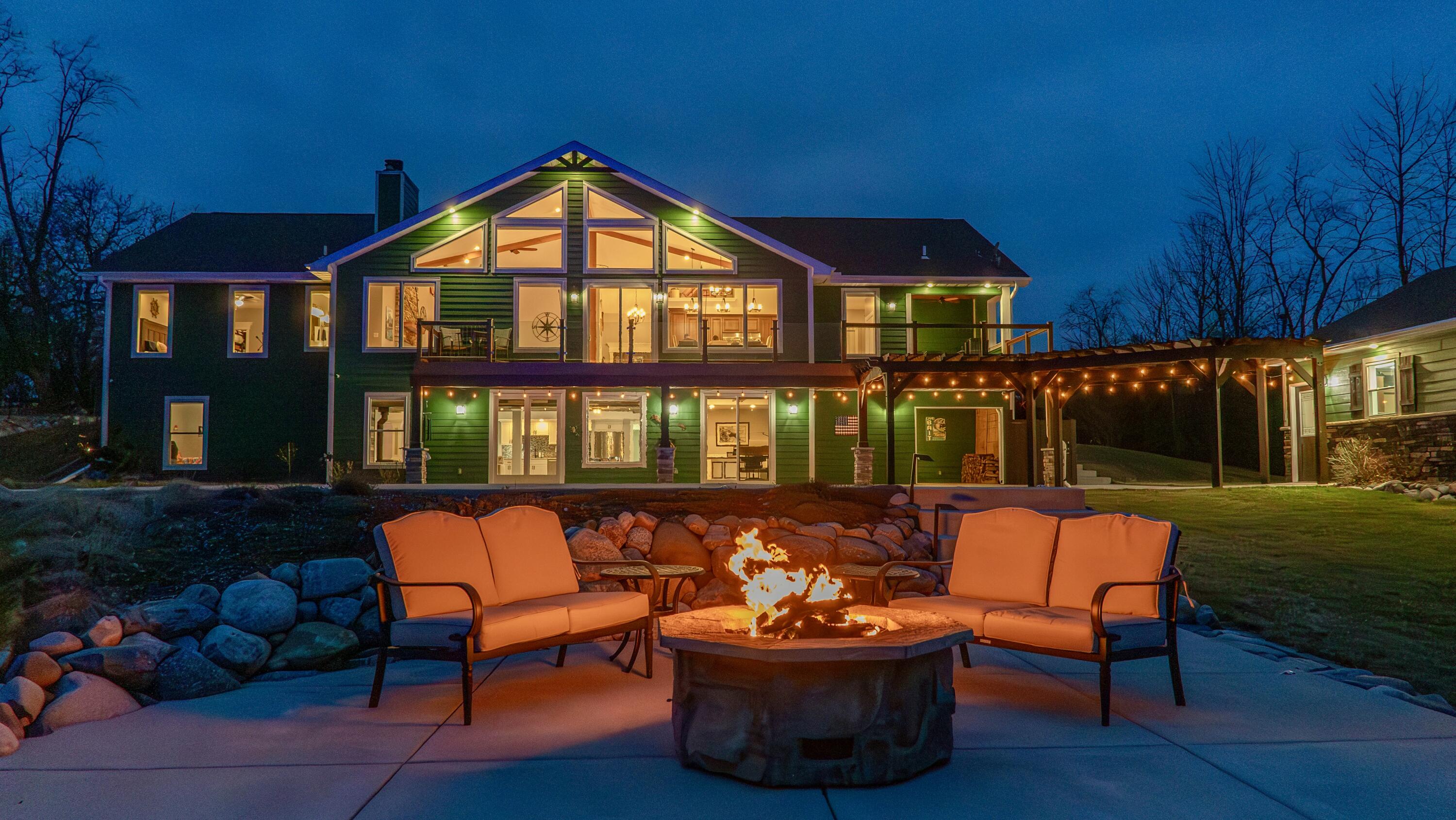 16489 Harrison Street Lowell, IN 46356 - Photo 66 of 67 a outdoor space with patio couches and a fireplace