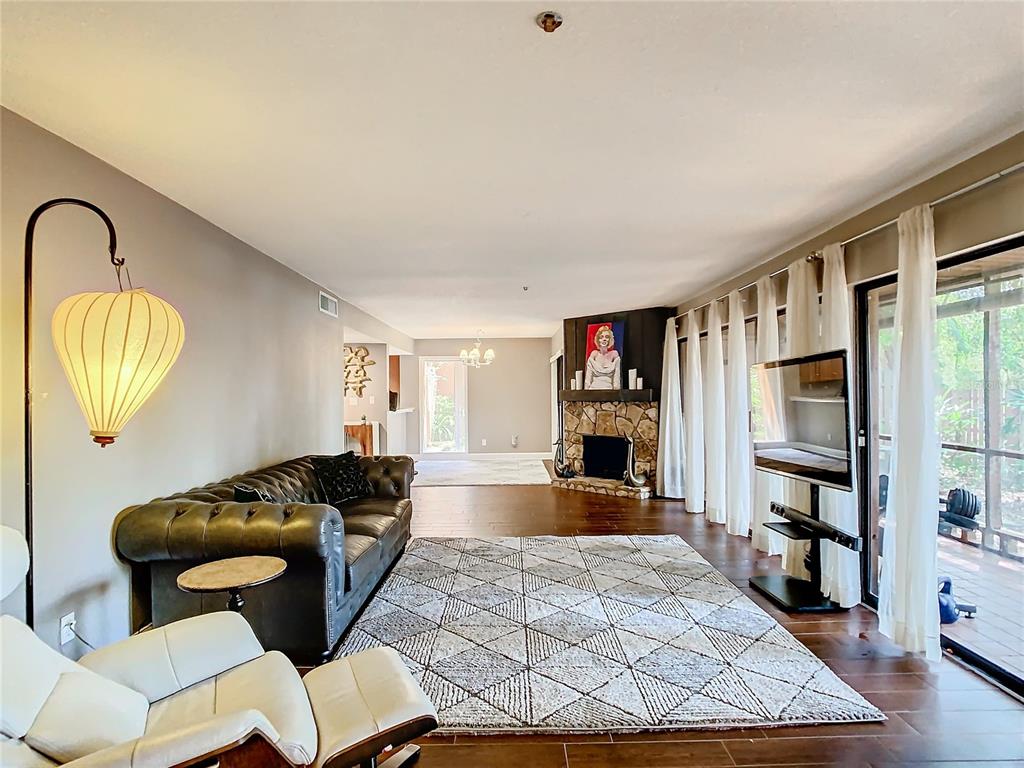 976 East Michigan Street, Unit A Orlando, FL 32806 - Photo 5 of 45 a living room with furniture and a window
