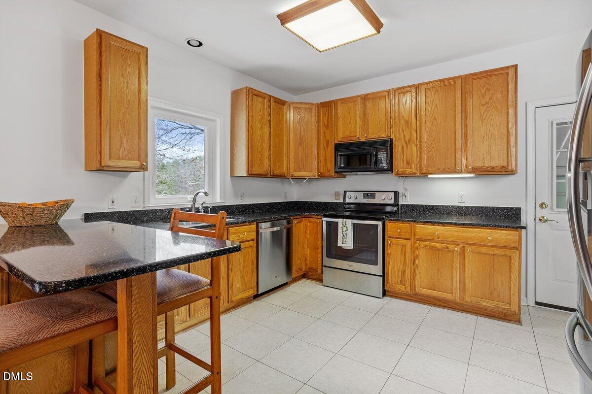 15004 New Light Road Wake Forest, NC 27587 - Photo 14 of 31 Spacious kitchen