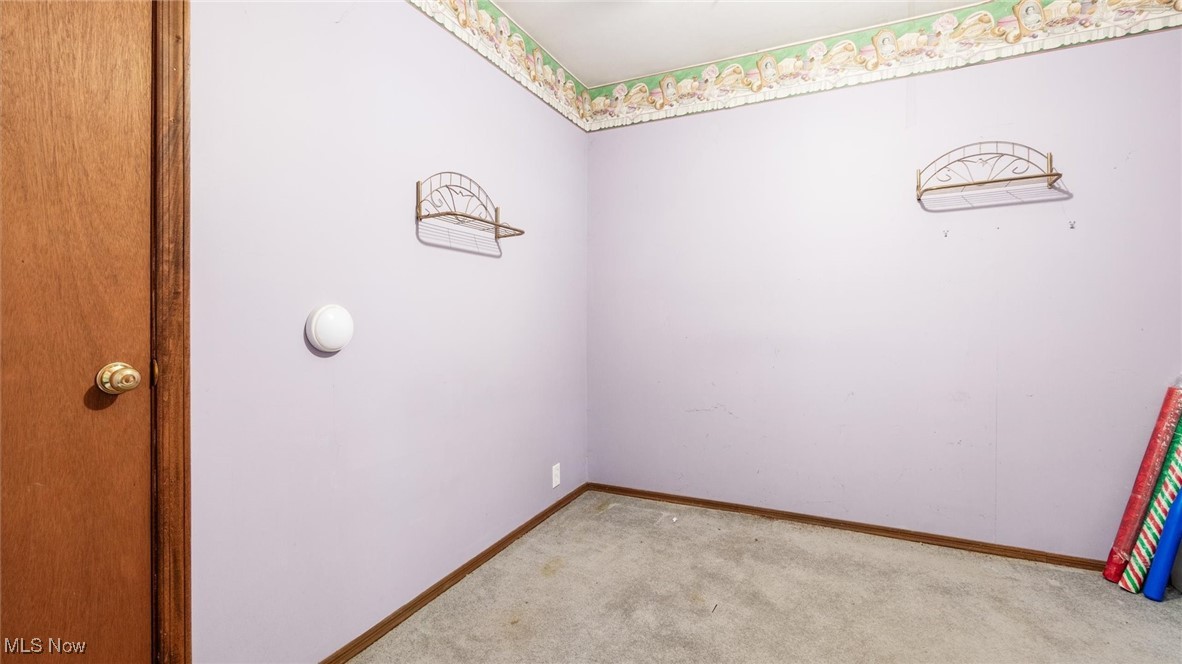 1950 Newark Road Zanesville, OH 43701 - Photo 37 of 39 Unfurnished room featuring light colored carpet
