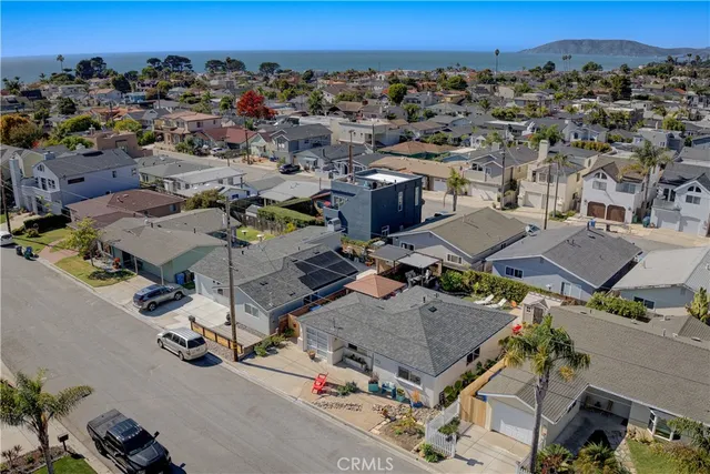 an aerial view of a swimming pool and mountain view