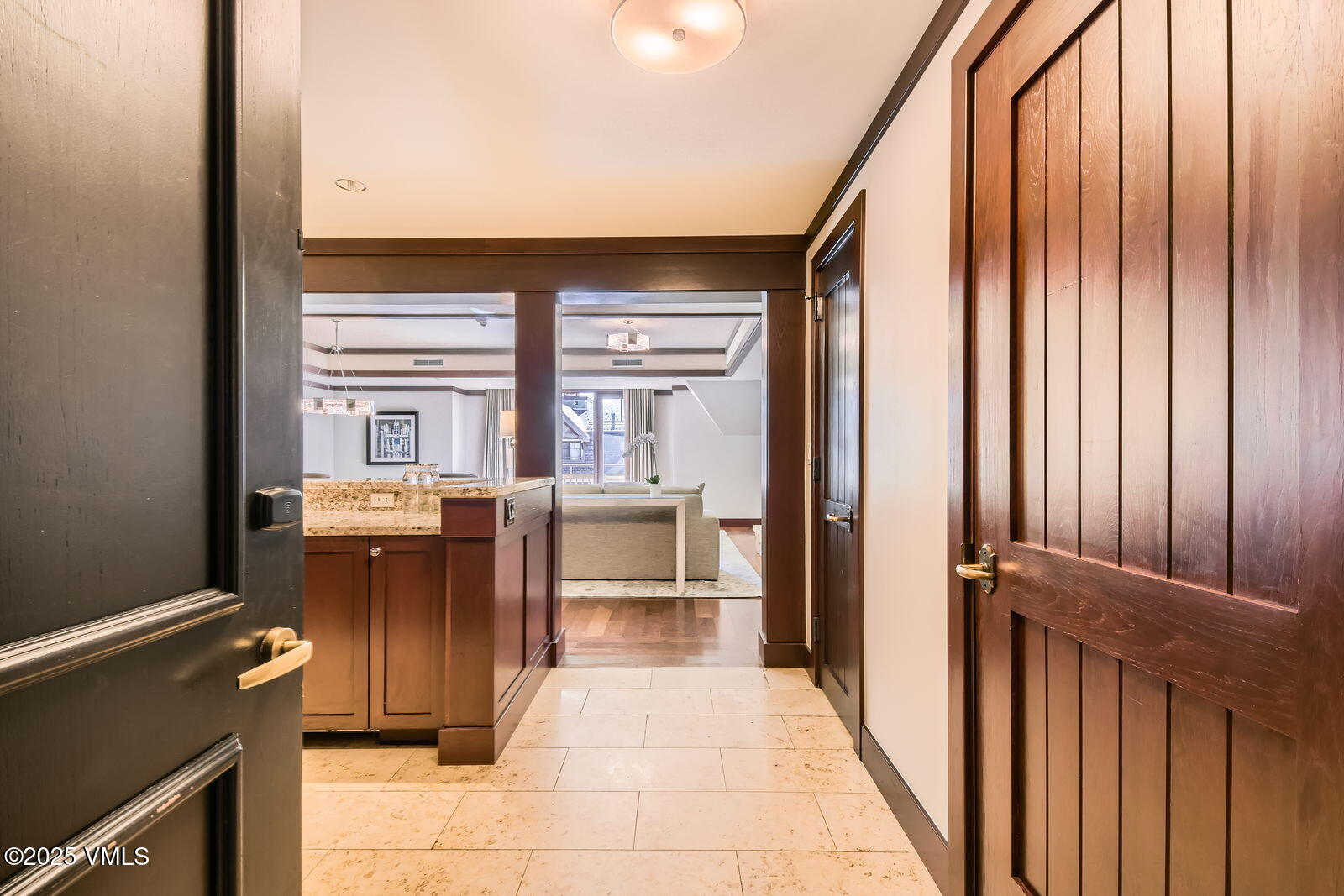 1 Vail Road, Unit 8101F Vail, CO 81657 - Photo 2 of 28 a room with a large window and furniture
