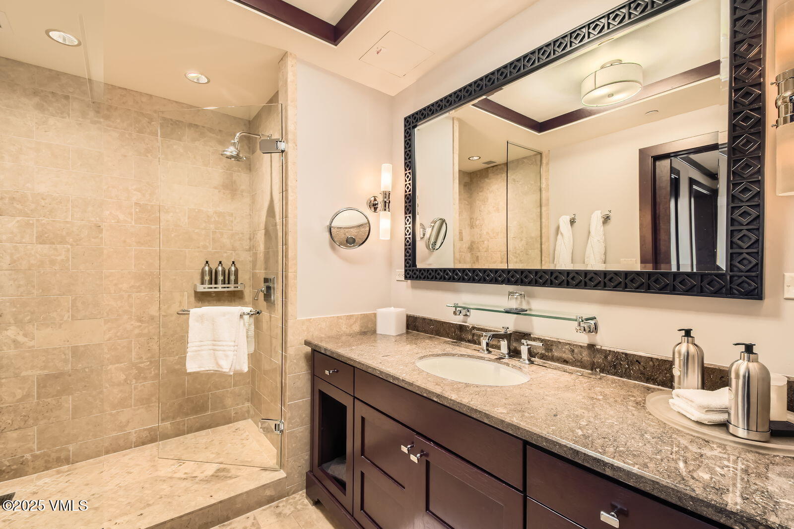 1 Vail Road, Unit 8101F Vail, CO 81657 - Photo 25 of 28 a bathroom with a granite countertop sink mirror and double
