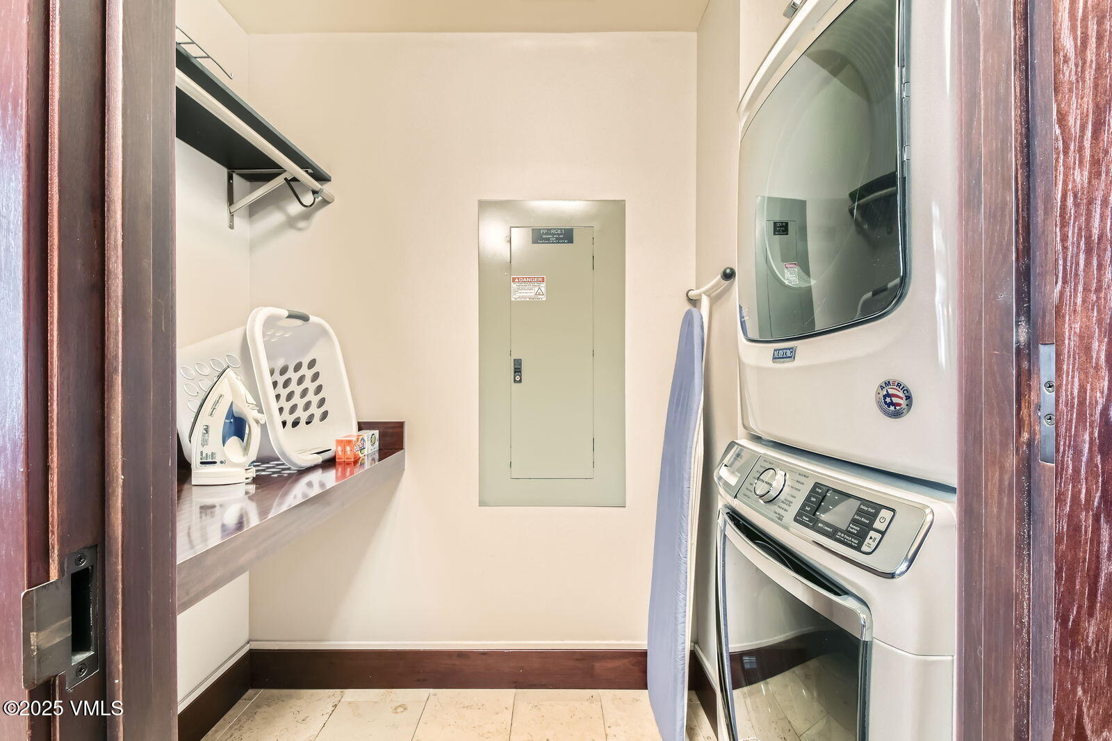 1 Vail Road, Unit 8101F Vail, CO 81657 - Photo 26 of 28 view of a hallway with washer and dryer