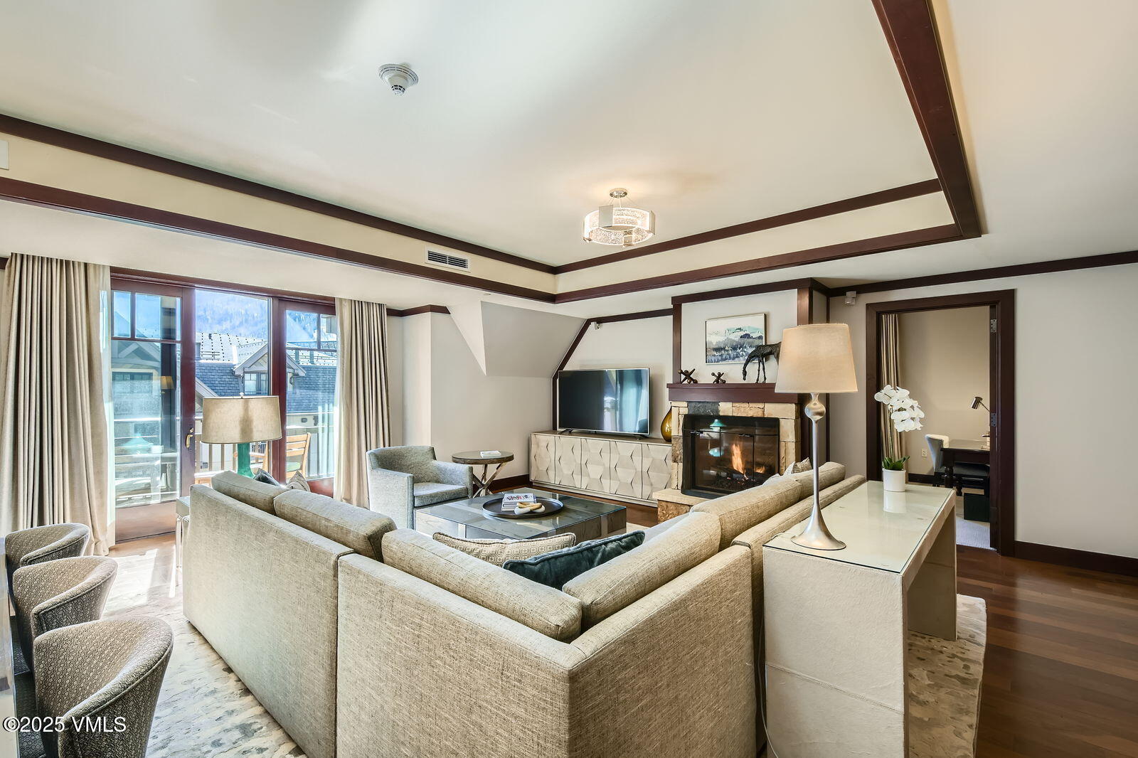 1 Vail Road, Unit 8101F Vail, CO 81657 - Photo 6 of 28 a living room with furniture and a large window