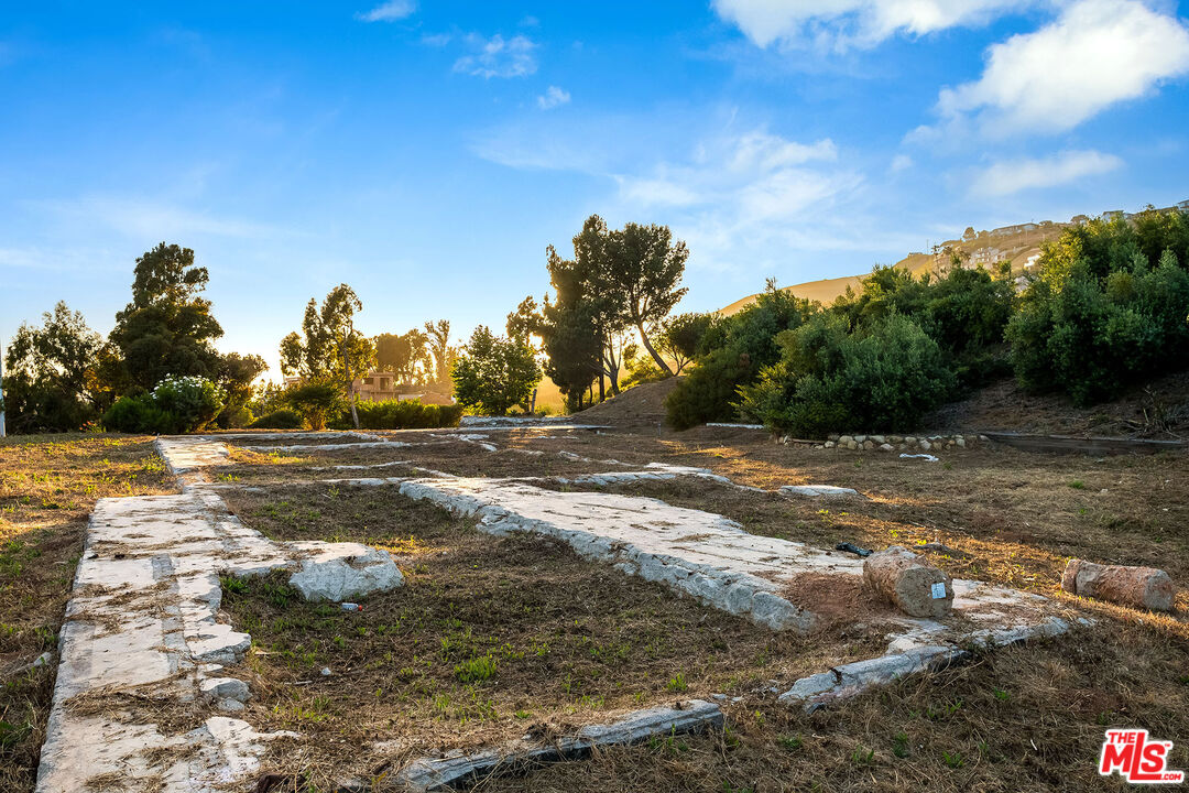 29829 Harvester Road Malibu, CA 90265 - Photo 30 of 44 a view of dirt yard with a large tree