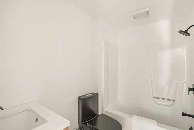 a bathroom with a sink and a toilet