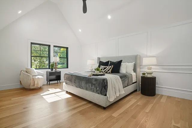 a bedroom with a bed and a couch