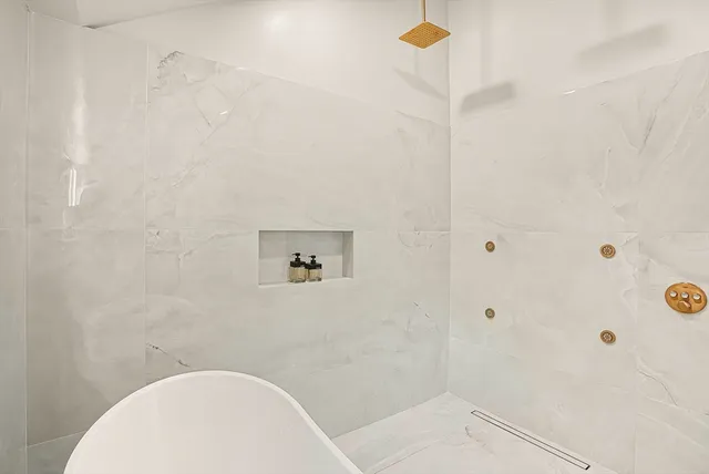 a bathroom with a sink and a shower