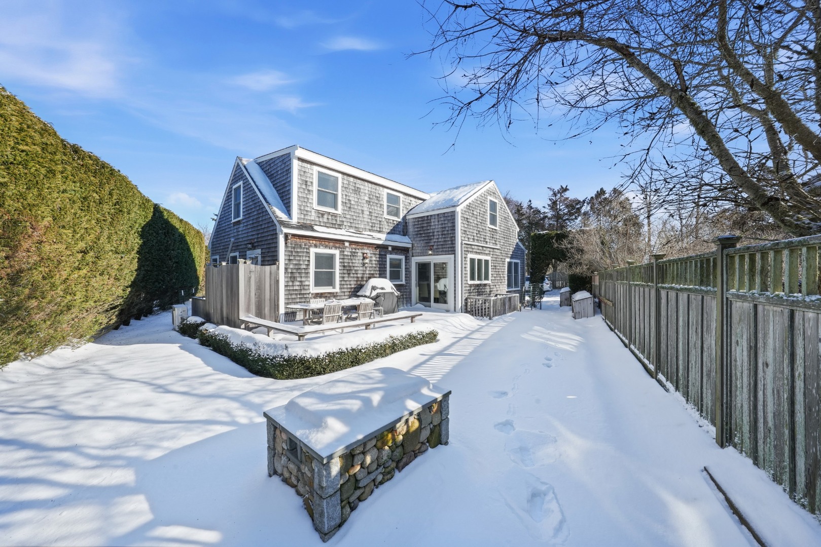 10 Pilgrim Road Nantucket, MA 02554 - Photo 57 of 65 a view of a house with wooden fence