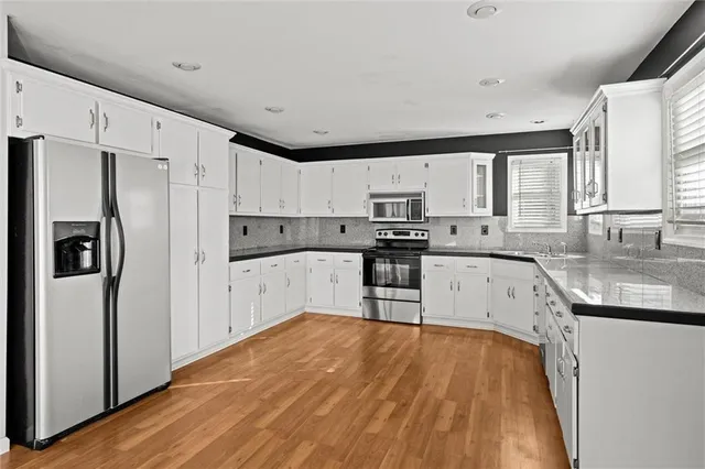 $397,500 | 741 Southwest Windsong Circle, Lee's Summit, MO 64082