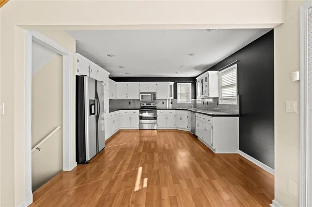 $397,500 | 741 Southwest Windsong Circle, Lee's Summit, MO 64082