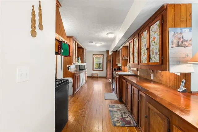 a kitchen with stainless steel appliances a stove and a refrigerator