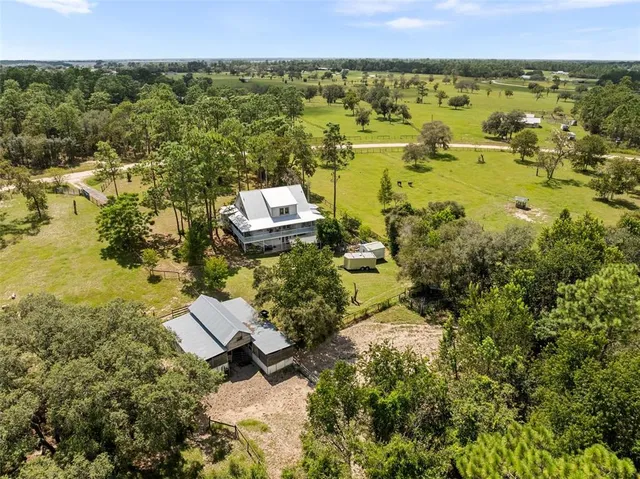 a view of a playground with basketball court