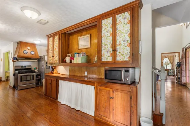 a view of walk in closet with clothes