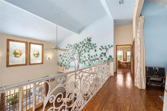 a view of a storage room with wooden floor
