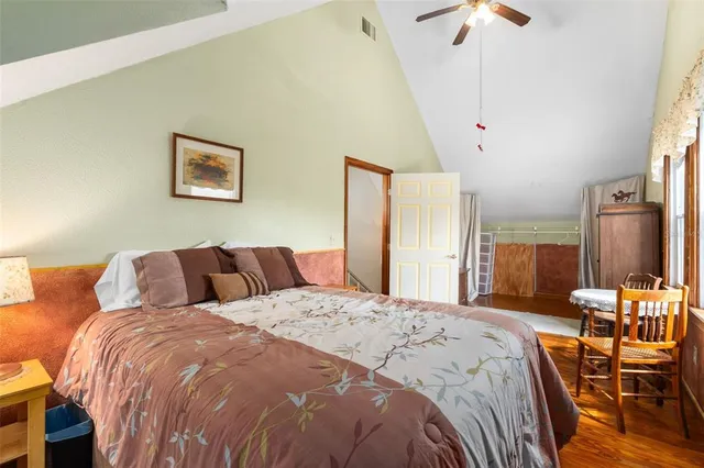 a view of a room with stairs and a large window