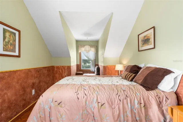 a view of a porch with a wooden fence