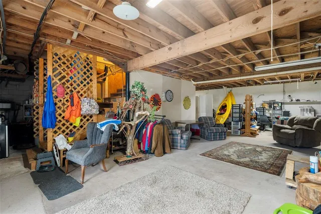 a view of living room and patio with wooden floor