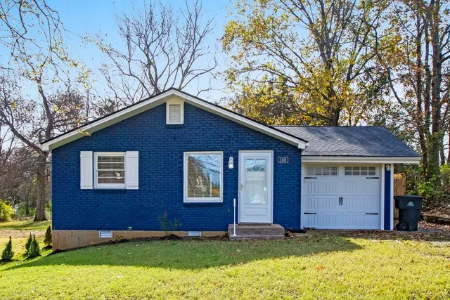 a backyard of a house with lots of green space