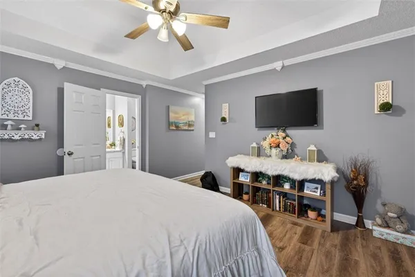 a bedroom with bed and window