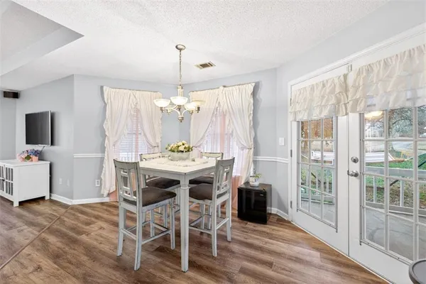 a living room with furniture fireplace and a flat screen tv