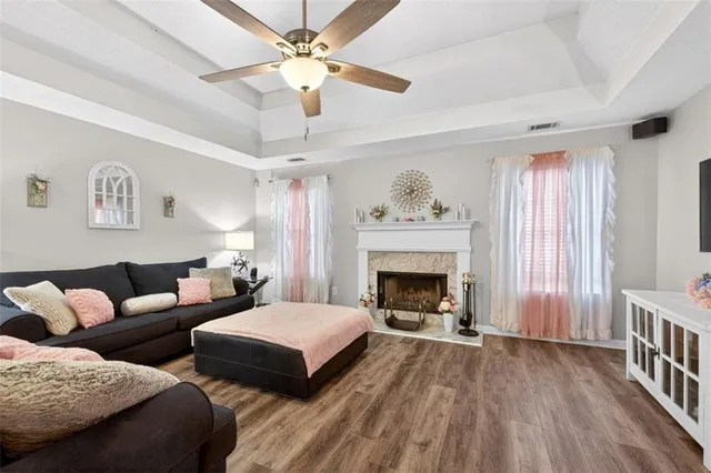 a bed room with a bed and a chandelier