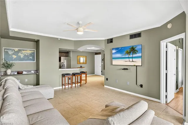 a living room with furniture and a table