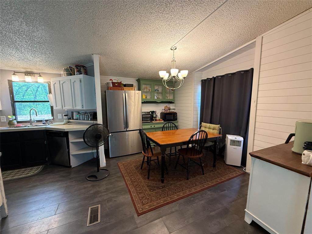 148 Indian Gap Road Mabank, TX 75156 - Photo 6 of 23 a dining room with furniture and window