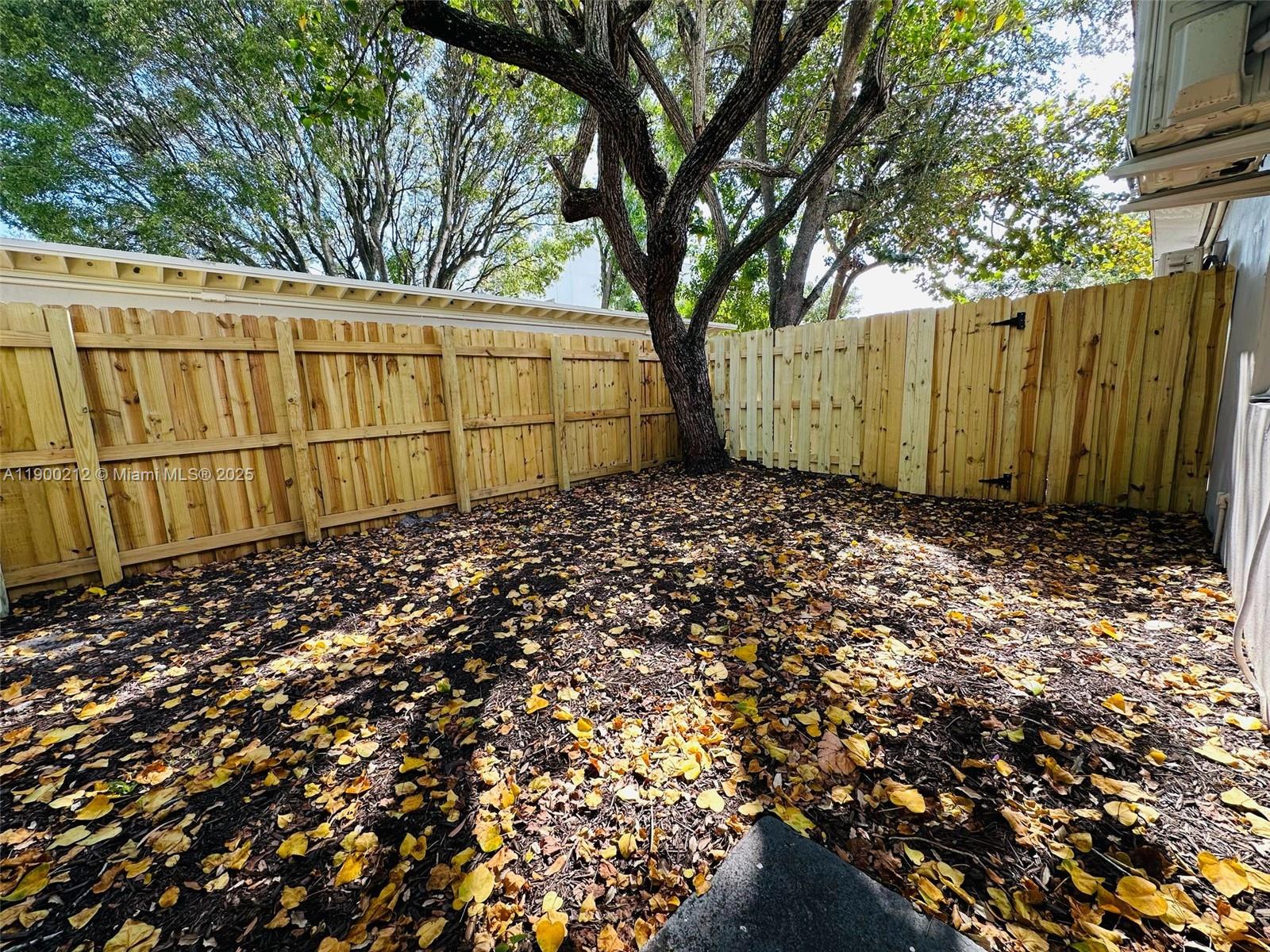 407 Southeast 14th Court, Unit 2 Fort Lauderdale, FL 33316 - Photo 14 of 16 a view of a backyard