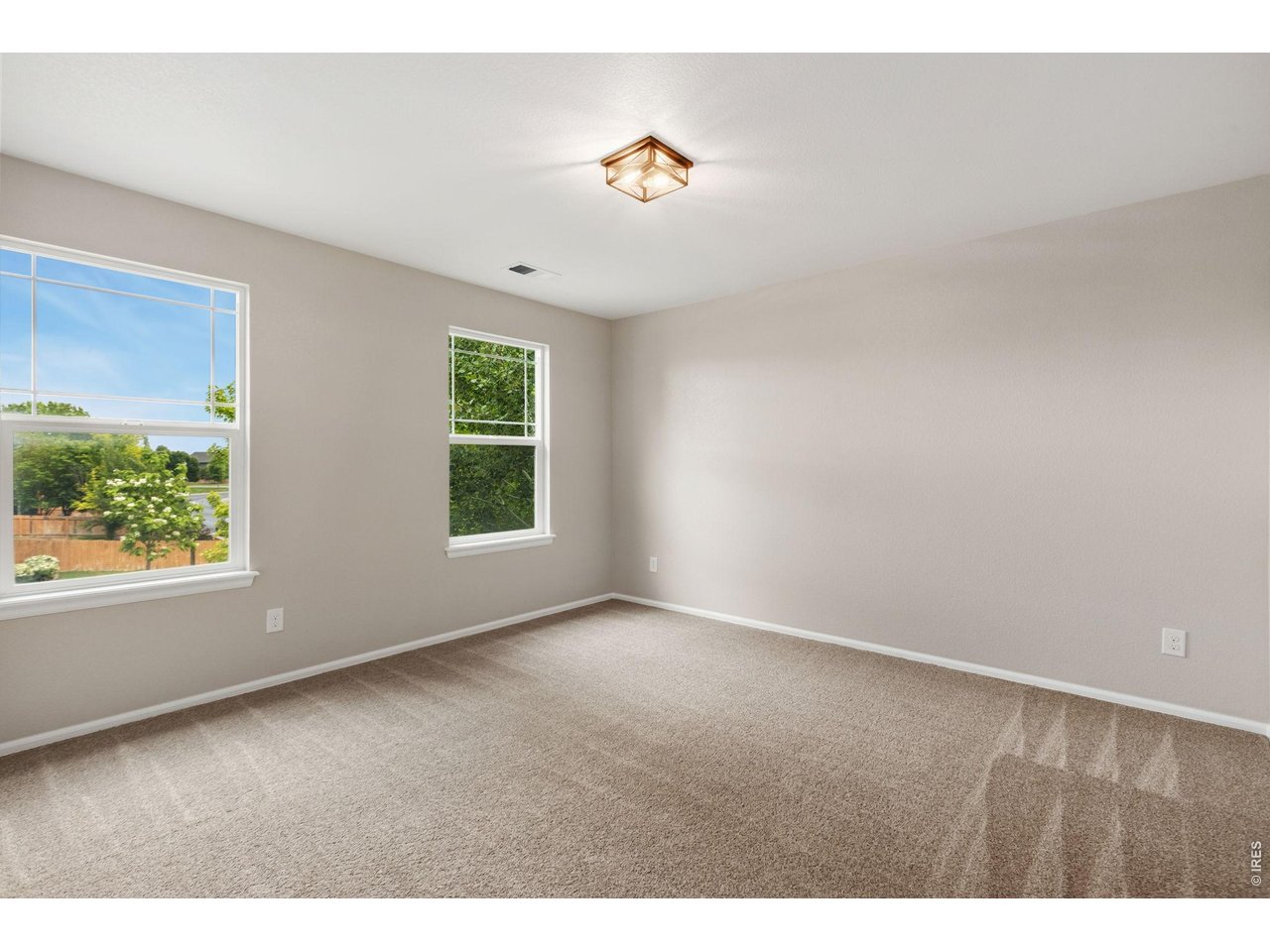 600 Botley Drive Windsor, CO 80550 - Photo 27 of 40 Bedroom 3 - Large windows throughout