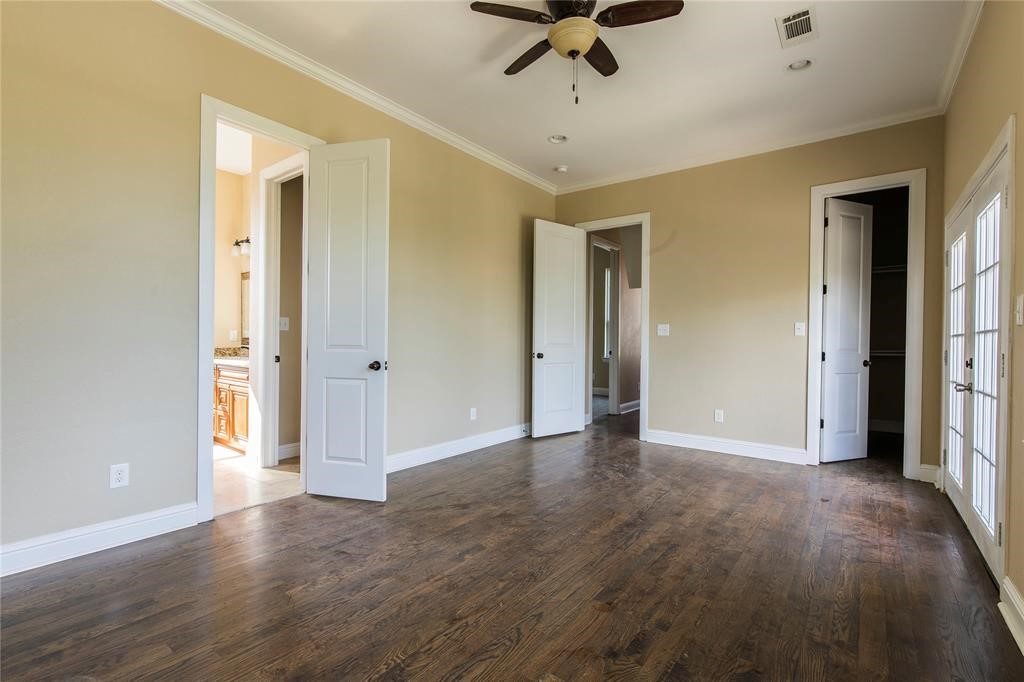 1424 Eddington Street Houston, TX 77023 - Photo 8 of 14 a view of a livingroom with a hardwood floor and a ceiling fan