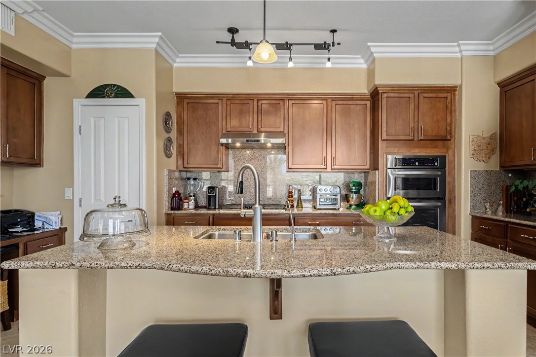 2555 Hampton Road, Unit 3308 Henderson, NV 89052 - Photo 18 of 65 A well-appointed kitchen features a large granite island and ample cabinet space.