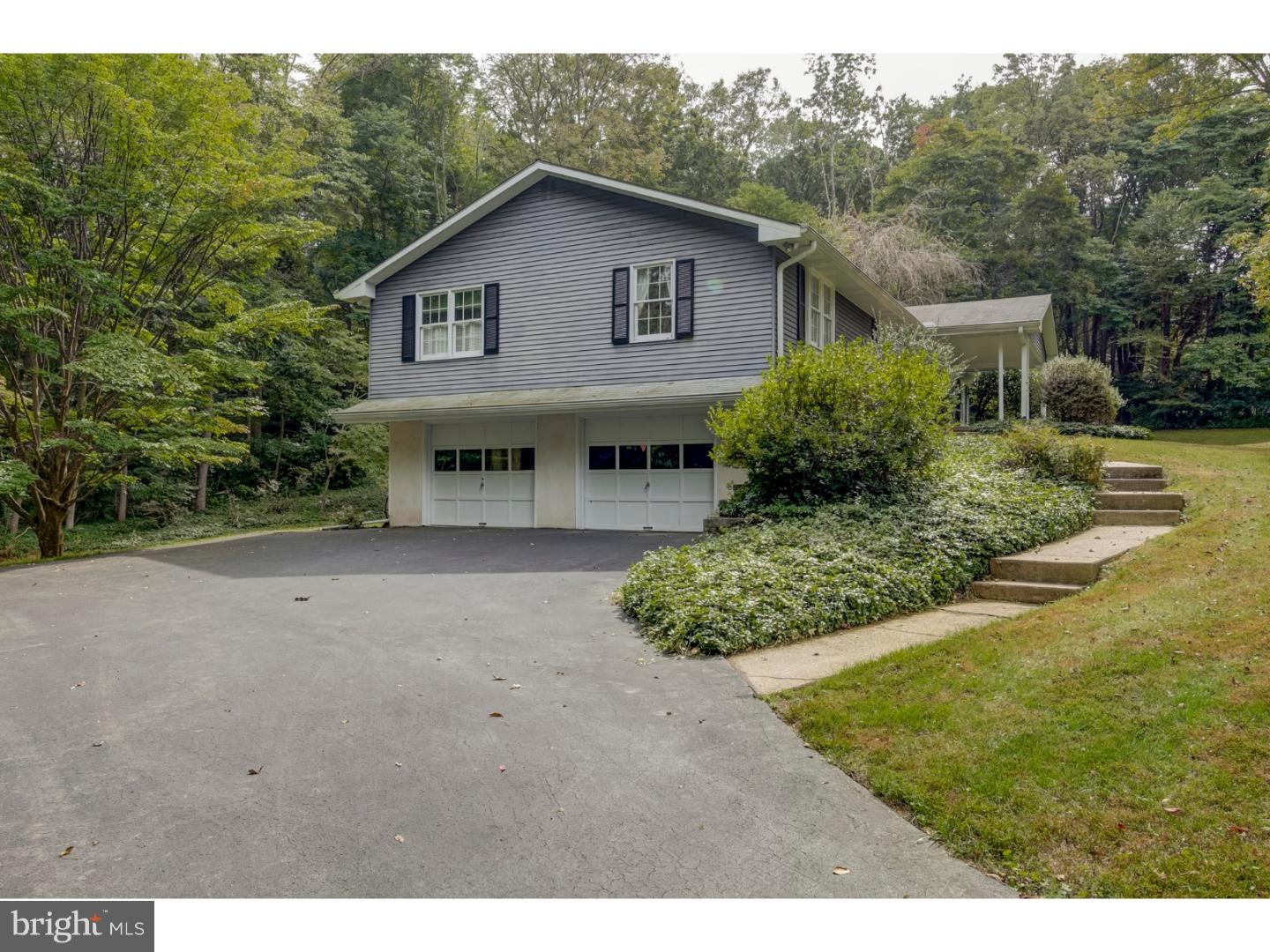 102 South Spring Valley Road Wilmington, DE 19807 - Photo 3 of 25 a view of backyard of house with green space