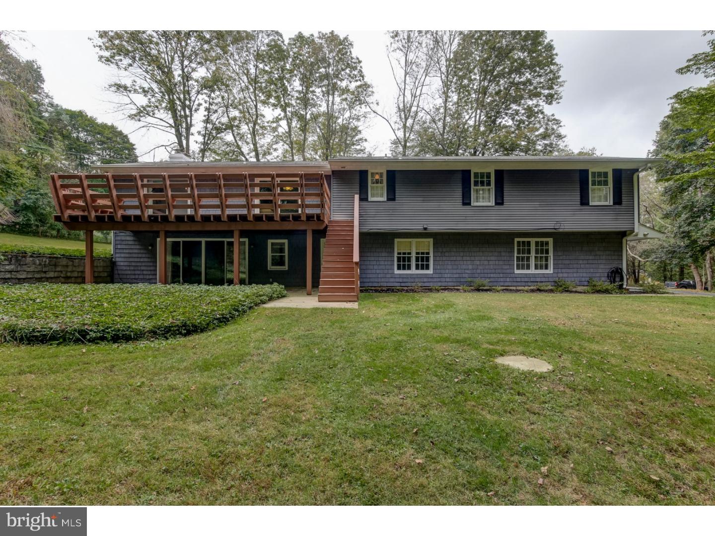 102 South Spring Valley Road Wilmington, DE 19807 - Photo 25 of 25 a front view of a house with a garden