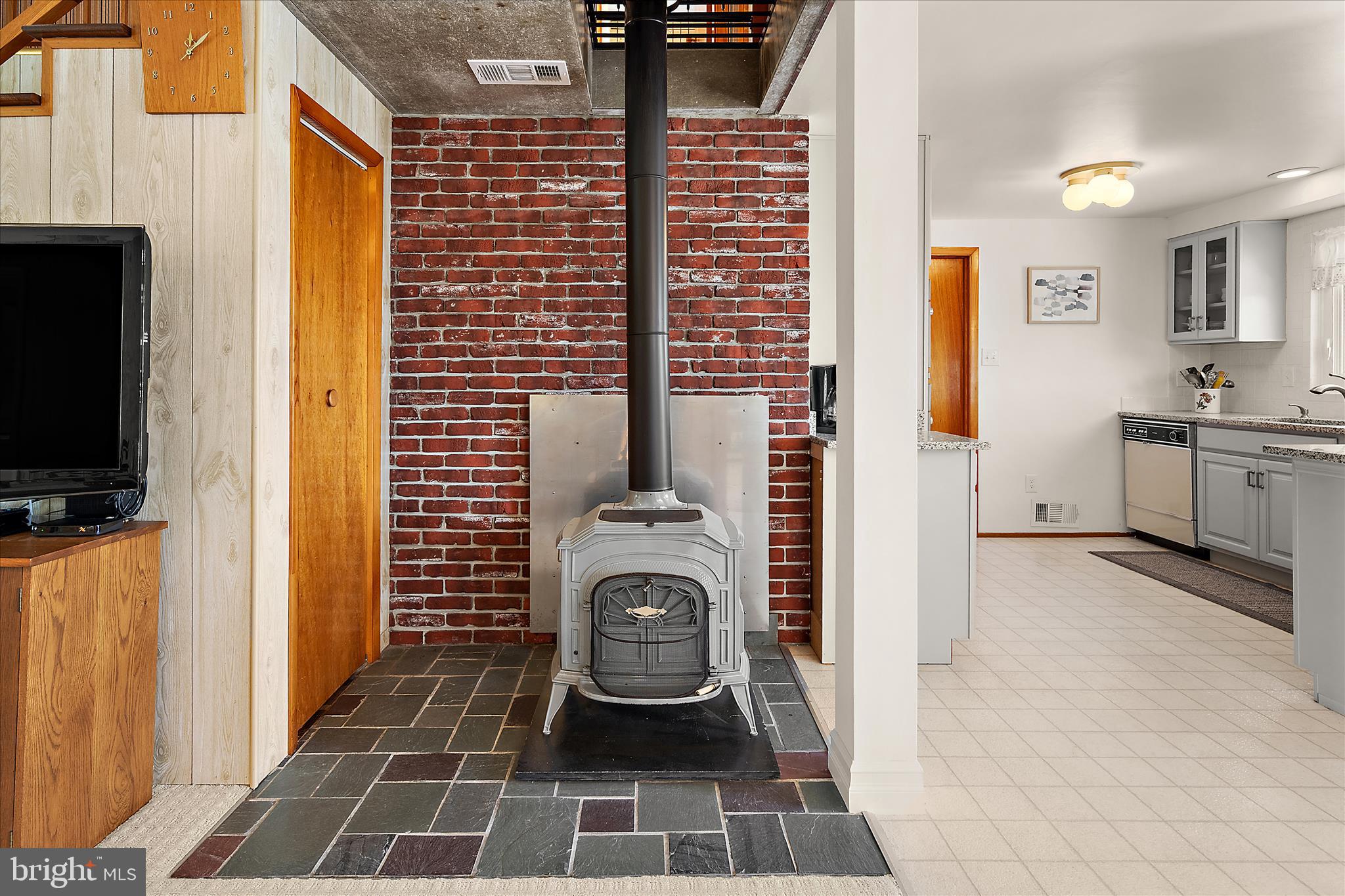 409 Rebecca Road South Bethany, DE 19930 - Photo 18 of 94 Vermont Castings wood stove