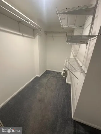 a view of a room with racks on the wall