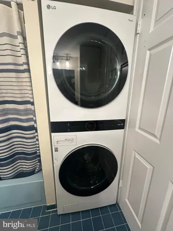 a view of washer and dryer in a bathroom