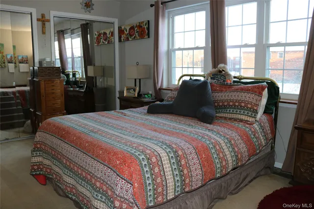 a bathroom with a sink a toilet and a shower